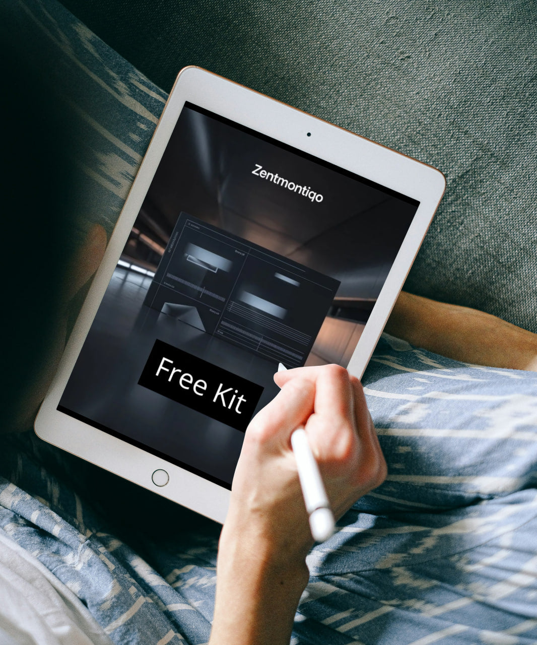 Person holding a tablet displaying Zentmontiqo on a textured surface